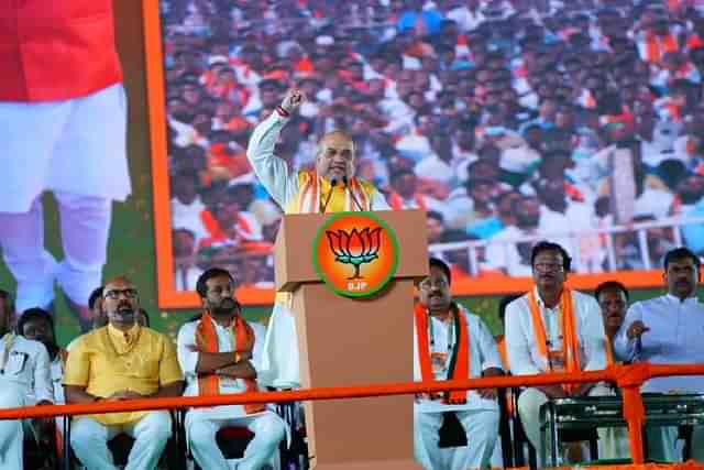 Union Home minister Amit Shah addressing the crowd at a rally in Telangana (@kishanreddybjp/Twitter)