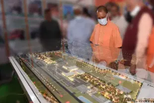 Uttar Pradesh CM Yogi Adityanath looking at a model of Noida airport (@AmanKayamHai_/Twitter) (Representative Image)