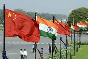 Indian and Chinese national flags on the lamp posts at the Raisina hills in New Delhi (Xinhua)
