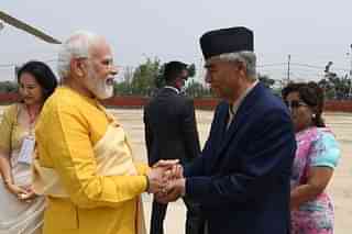 Nepalese Prime Minister Sher Bahadur Deuba welcomes Prime Minister Narendra Modi. 