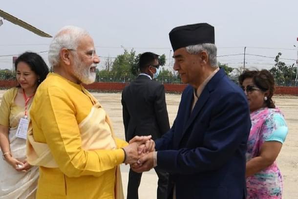 Nepalese Prime Minister Sher Bahadur Deuba welcomes Prime Minister Narendra Modi.