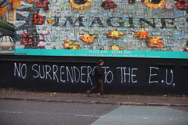 A wall in Northern Ireland separating catholic and protestant communities 