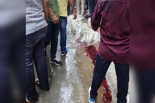 Outside the victim's shop