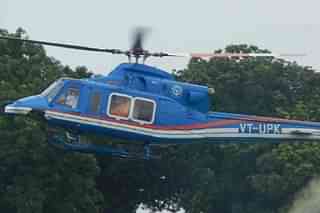 Helicopter carrying UP CM Yogi Adityanath (@Namita_TNIE/Twitter)