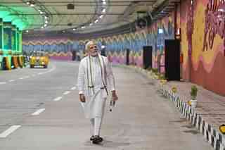 PM Narendra Modi walking inside the six-lane main tunnel built under Pragati Maidan in Delhi 
