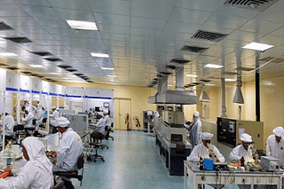 Employees at a semiconductor facility (Photo: Semi-Conductor Laboratory)