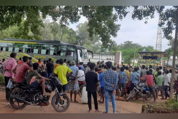 People assembled in front of the police station