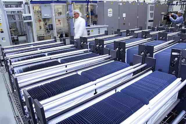 Wafers stacked inside a solar cell manufacturing plant (Wikimedia Commons)