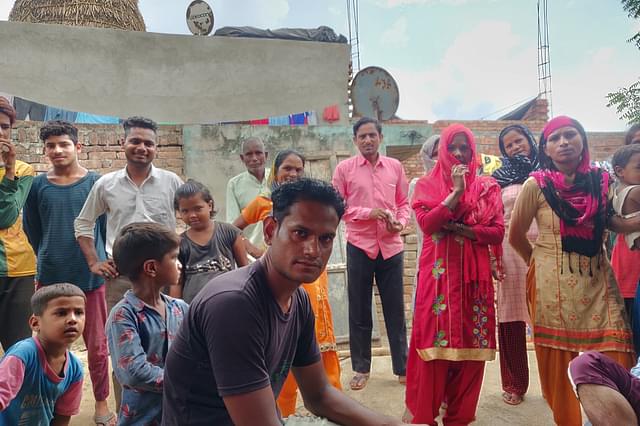 At Baburam’s house in Bhojhahedi village on 11 July. The man in front is Deepak, a nephew of Baburam