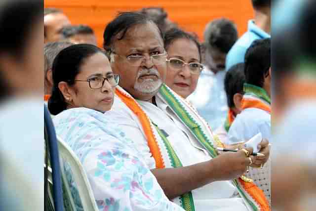 Mamata Banerjee and Partha Chatterjee.