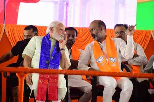 PM Narendra Modi and Telangana BJP chief Bandi Sanjay Kumar (Twitter) 