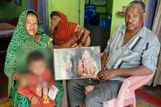 Poonam’s parents with a picture of her at their house in Kotma, Anuppur, Madhya Pradesh 