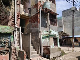 Preeti and Firoz lived on the first floor of the house with the water tank