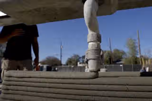 A house being constructed using 3D printing technology
