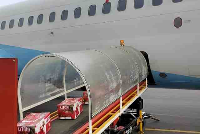 Fresh litchis being loaded on a flight to Mumbai from Darbhanga Airport (@HardeepSPuri/Twitter)