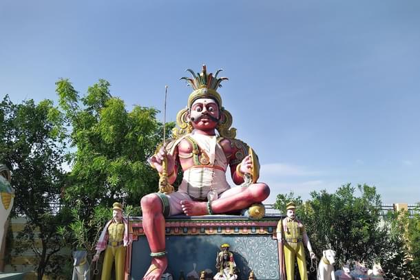 Police Men in uniform with their assistant dogs accompany the Guardian Deity.