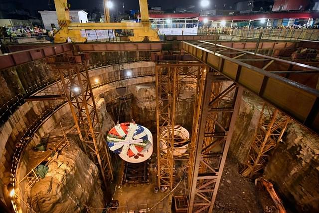 A tunnel boring machine (TBM) being lowered down a shaft. (Kunal Patil/Hindustan Times via Getty Images)