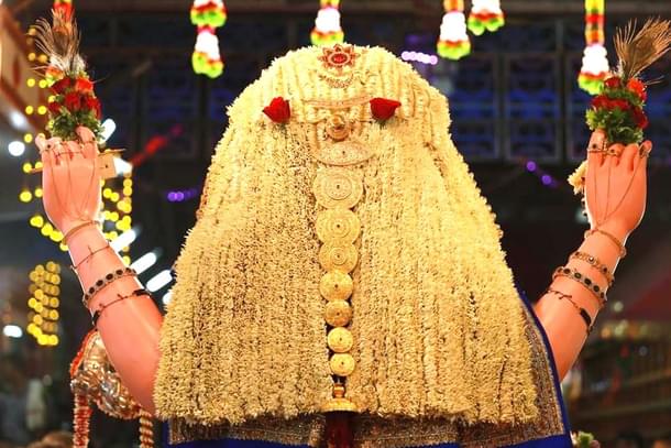 Son-phool on the day of procession(Sharada Mahotsava Samiti)