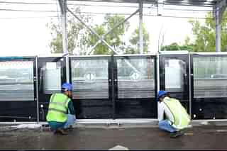 Installation of platform screen doors at RRTS stations.
