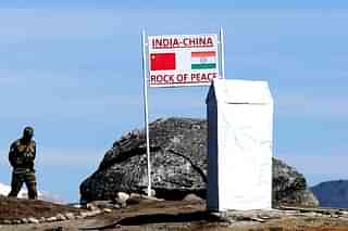 An Indian Army soldier keeps vigil at the India-China border in Arunachal Pradesh. (BIJU BORO/AFP/GettyImages).