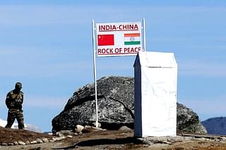 An Indian Army soldier keeps vigil at the India-China border in Arunachal Pradesh. (BIJUBORO/AFP/GettyImages).