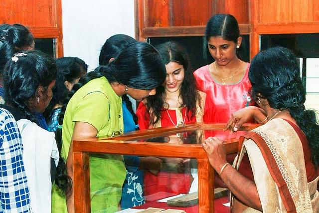 Studying palm leaf manuscripts during a course on Indian Knowledge Systems at the Chinmaya Vishwa Vidyapeeth, Ernakulam, Kerala.