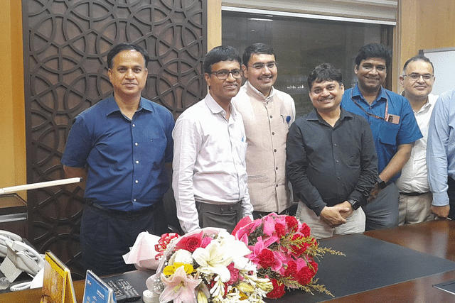 Dr M Srinivas (second person from the left)