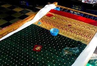 The saree woven with threads of real gold costs Rs 8 lakh