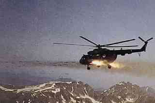 A Mi-17 gunship unleashing 57mm rockets at targets on the heights above Dras. (Indian Air Force)