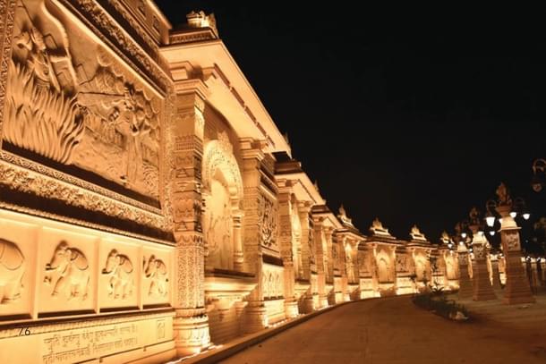 the murals of mahakal lok lit at night