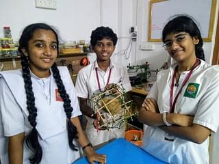 Innovators all: From left: Sanjula Sreekumar, Vyshak Ajit and Madhumati Anand with the Tensegrity solution for safe air drops of fragile payloads they created.
