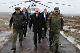 Russian President Vladimir Putin with top defence officials.
