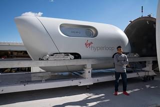 Pune-origin Tanay Manjrekar was among the first humans to  test-ride the Hyperloop pod seen in the background.