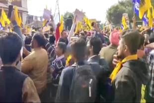 Teachers from Punjab protest during AAP rally in Solan, Himachal Pradesh.