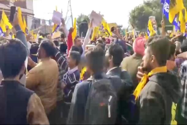 Teachers from Punjab protest during AAP rally in Solan, Himachal Pradesh.