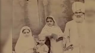 A picture of Azghari Begum with her father Taj Mohammed (she is the first child on his right)
