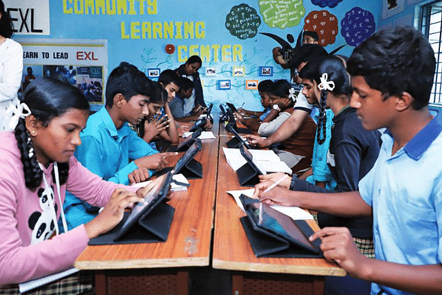 Students of Hebbagodi Government School, Bengaluru, use an AI-powered learning tool. (PC: UNESCO:2022 State of Education Report-India)