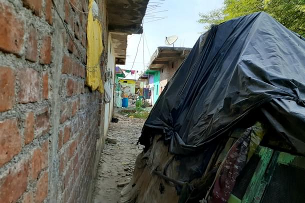 The narrow passage leading to Gond houses built under Pradhan Mantri Awas scheme.