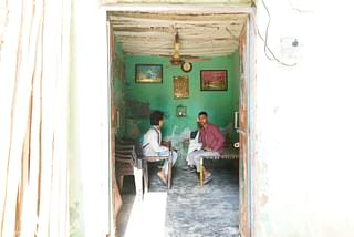 In Arif’s house. On the left is Swarajya correspondent while on the right is Arif’s nephew 