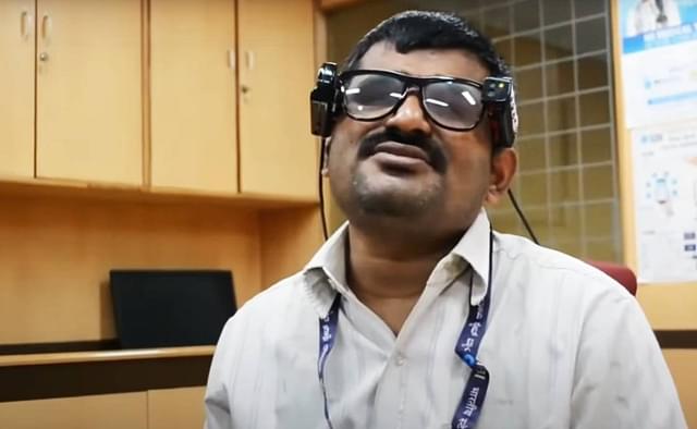 Visually Challenged SBI Manager H. Nagraj using  Smart Vision glasses