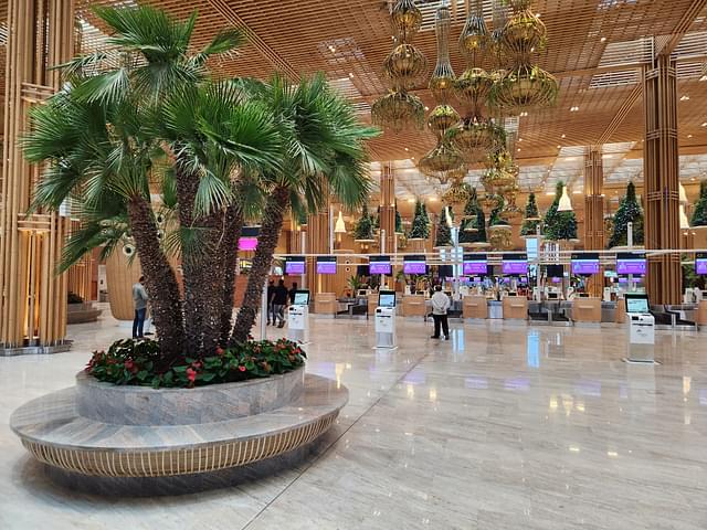 The garden terminal features trees, small gardens and ponds with local species of plants.