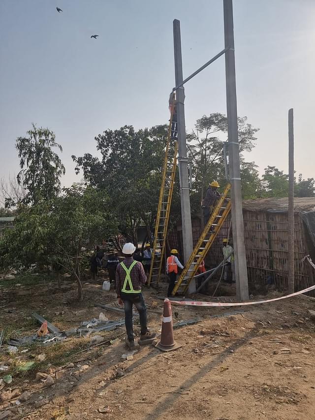 Electricity poles being set up