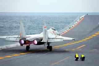 A J-15 fighter takes off from the China's Liaoning aircraft carrier in the Yellow Sea. (China Daily)

