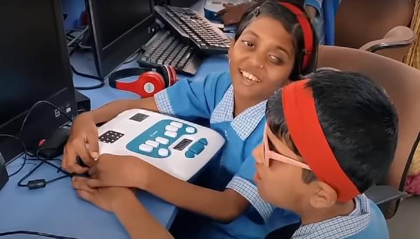 Visually challenged children in India using the Annie braille trainer