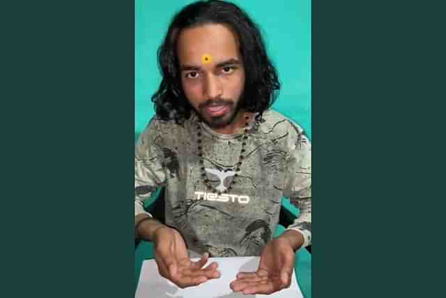 A still from a video of Shubham requesting police to return his phone.