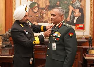 Armed forces flag being pinned on COAS General Manoj Pande