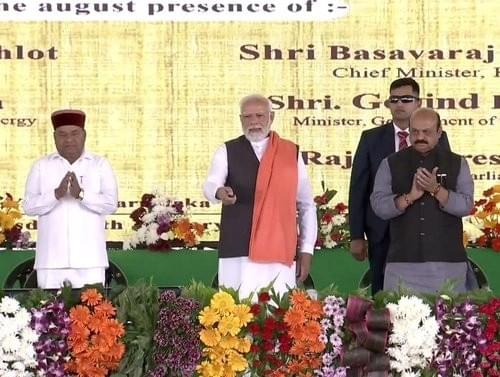 Prime Minister Narendra Modi, Governor Thawar Chand Gehlo and CM Basavaraj Bommai at the event in Kodekal (Narendra Modi/Youtube)