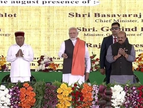 Prime Minister Narendra Modi, Governor Thawar Chand Gehlo and CM Basavaraj Bommai at the event in Kodekal (Narendra Modi/Youtube)