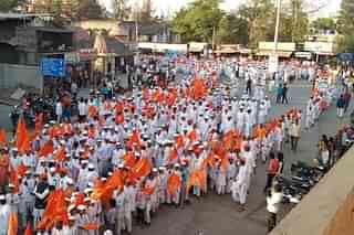People participating in the Alandi rally.