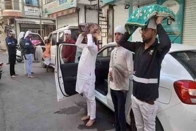 A picture of the Guru Granth Sahib copies being taken to a Gurudwara two days ago in Indore.